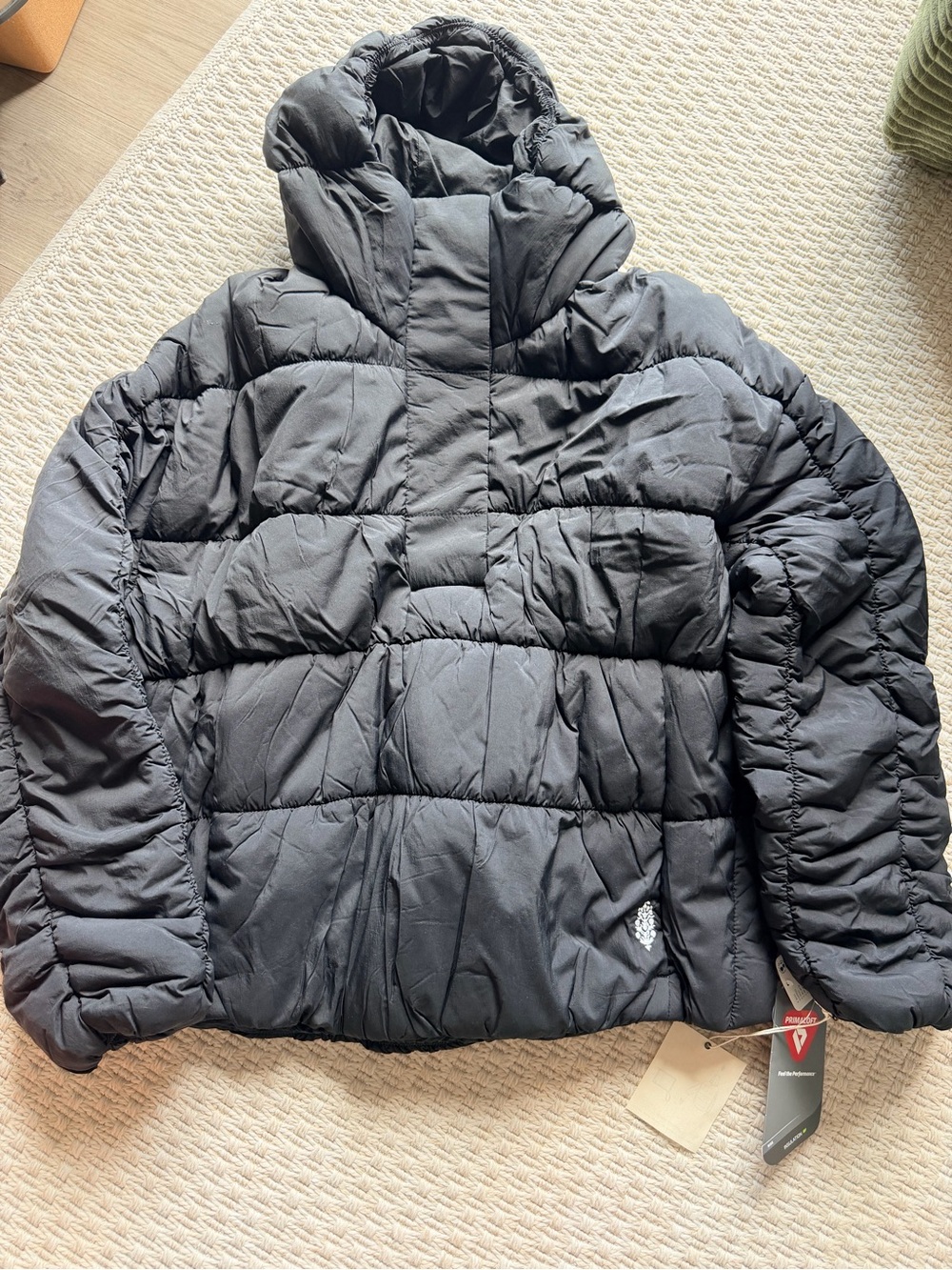 Black packable puff jacket